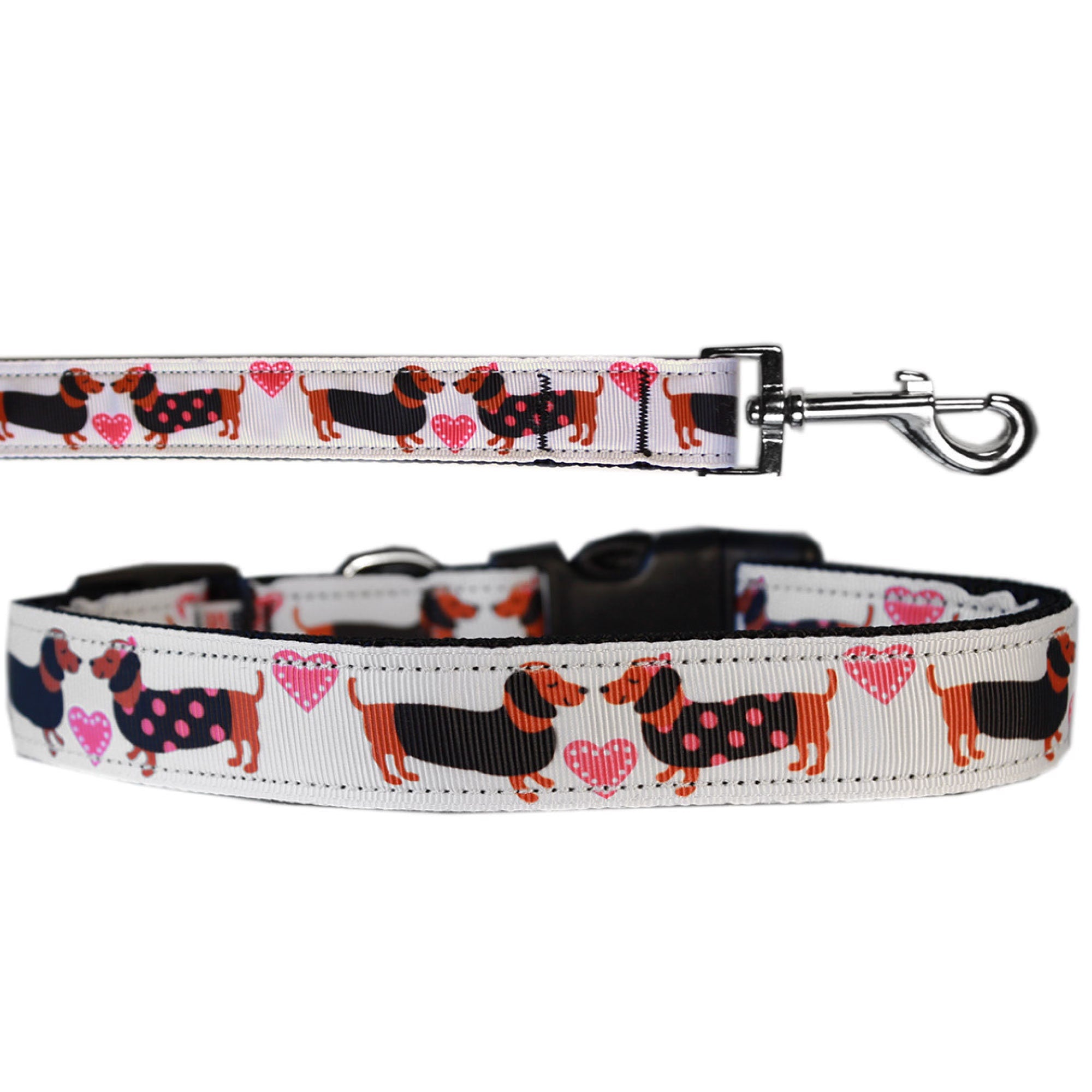 A stylish pink nylon collar and leash set for dogs and cats, featuring a charming 'Pink Doxie Love' design, showcasing durability and safety features.