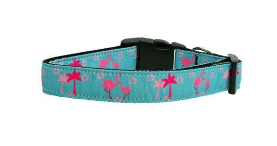 A vibrant pink nylon collar and leash featuring a pink flamingo design, suitable for dogs and cats, showcasing durability and style.