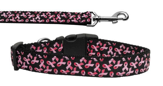 Stylish pet collar and leash featuring pink ribbons on a black nylon background, suitable for dogs and cats.