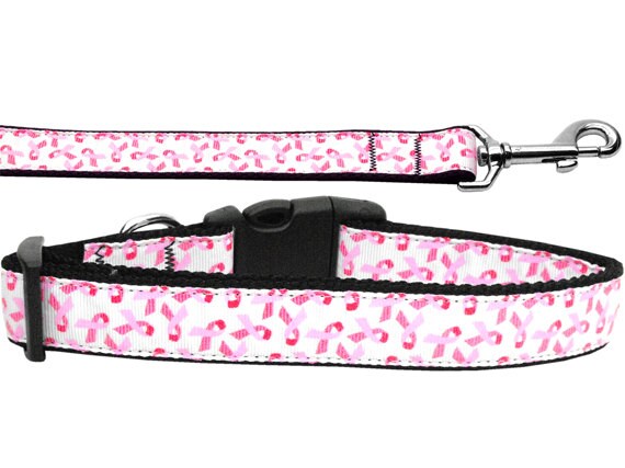 A stylish pet collar and leash set featuring pink ribbons on a white nylon background, suitable for dogs and cats.