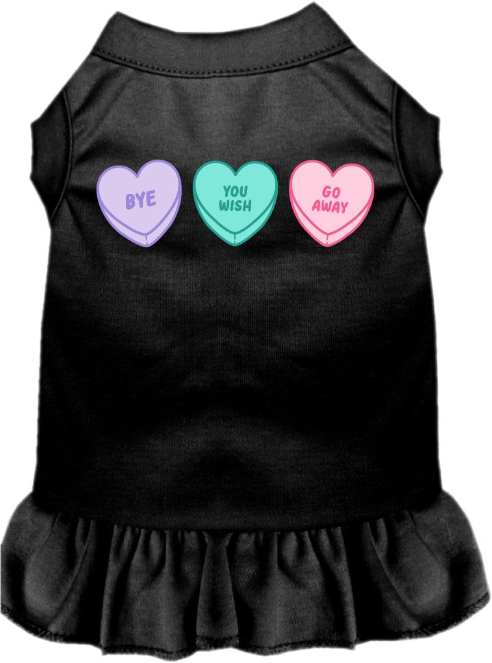 A small to medium pet wearing a cute Anti Valentines Hearts dress with ruffles, showcasing a playful design.