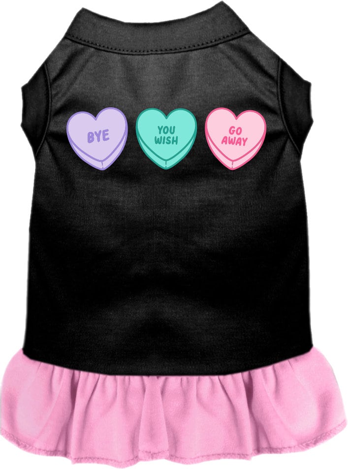 A small to medium pet wearing a cute Anti Valentines Hearts dress with ruffles, showcasing a playful design.
