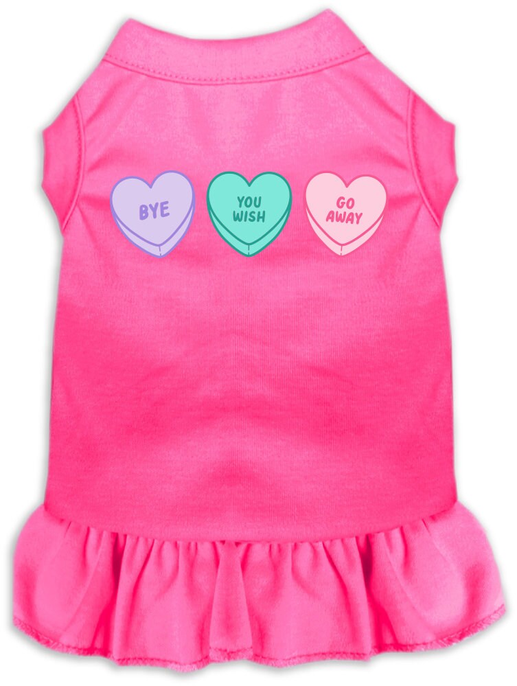 A small to medium pet wearing a cute Anti Valentines Hearts dress with ruffles, showcasing a playful design.