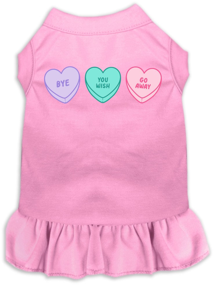 A small to medium pet wearing a cute Anti Valentines Hearts dress with ruffles, showcasing a playful design.