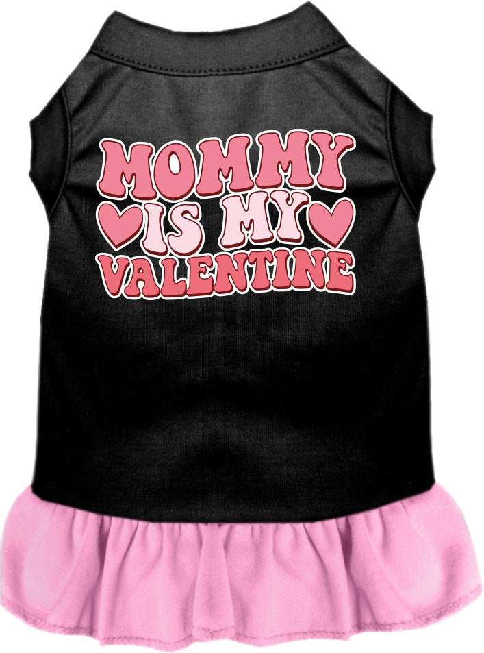 A medium to large pet wearing a cute screen printed dress with ruffles, featuring the text 'Mommy Is My Valentine'.