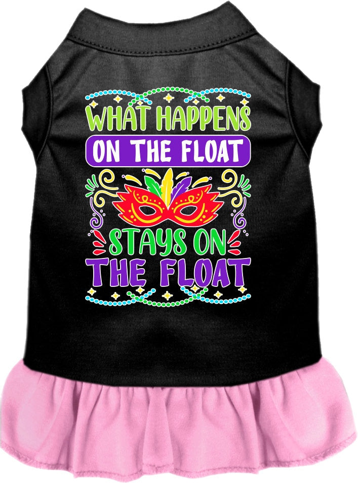 A medium to large pet wearing a cute screen printed dress with ruffles, featuring the phrase 'What Happens On The Float, Stays On The Float'.