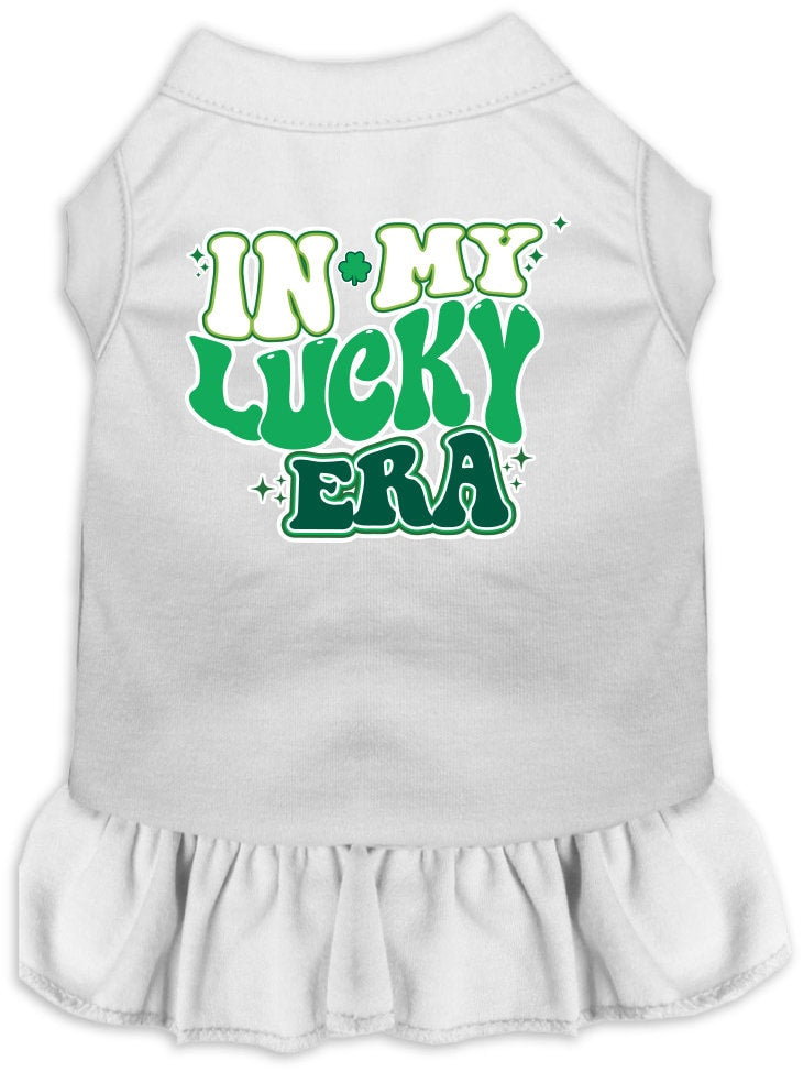 A medium to large pet wearing a stylish screen printed dress with ruffles, featuring the phrase 'In My Lucky Era'.