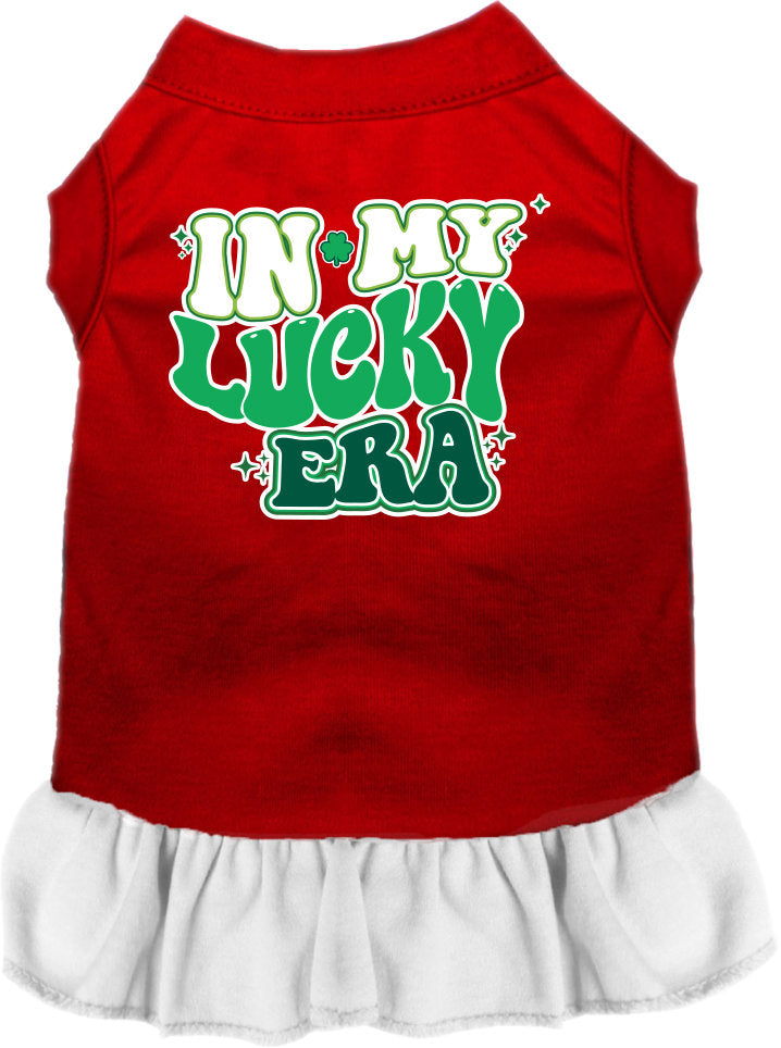 A medium to large pet wearing a stylish screen printed dress with ruffles, featuring the phrase 'In My Lucky Era'.