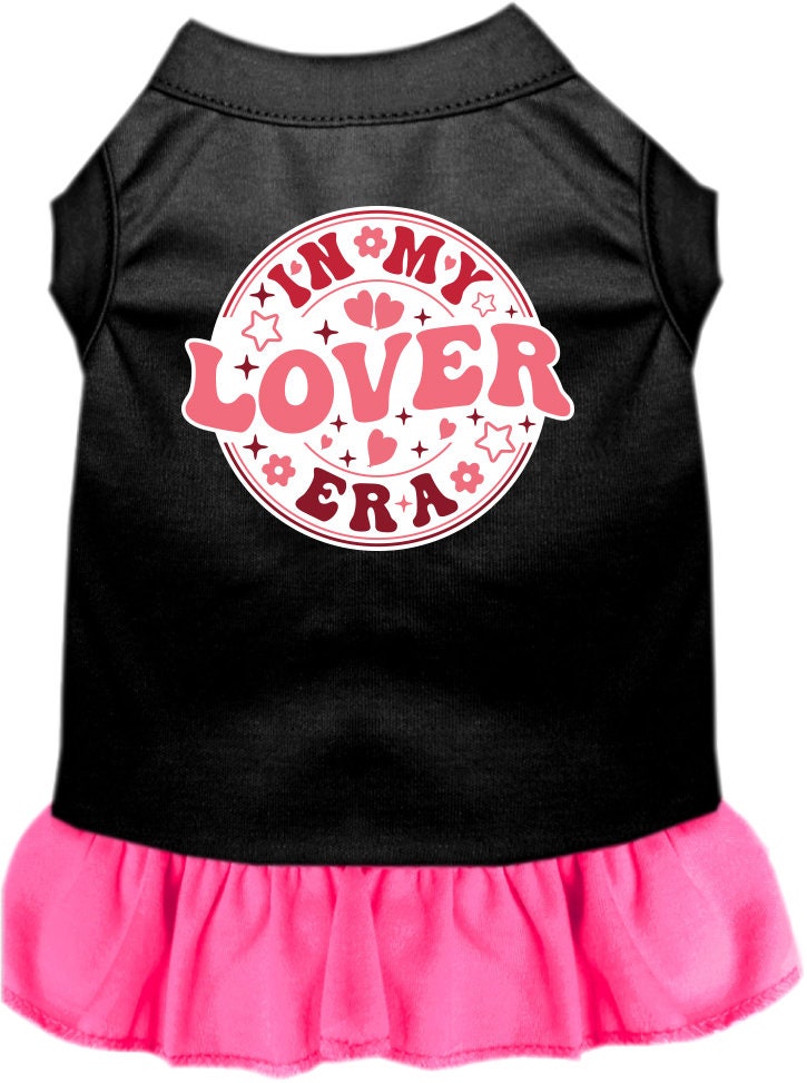 A small to medium pet wearing a stylish screen printed dress with ruffles, labeled 'In My Lover Era', showcasing comfort and cuteness.
