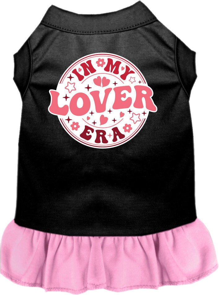 A small to medium pet wearing a stylish screen printed dress with ruffles, labeled 'In My Lover Era', showcasing comfort and cuteness.