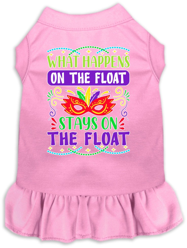 A small to medium pet wearing a cute screen printed dress with ruffles, featuring the slogan 'What Happens On The Float, Stays On The Float'.
