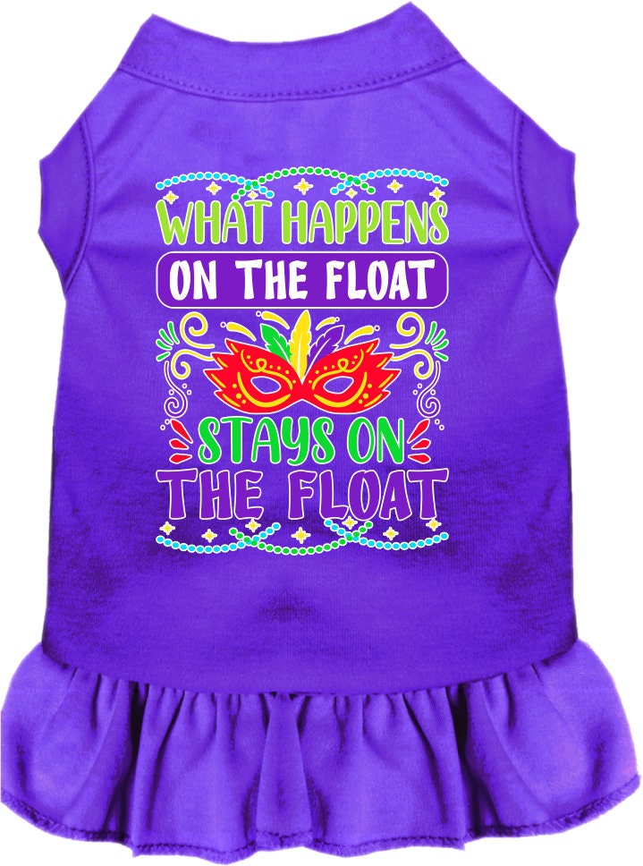 A small to medium pet wearing a cute screen printed dress with ruffles, featuring the slogan 'What Happens On The Float, Stays On The Float'.