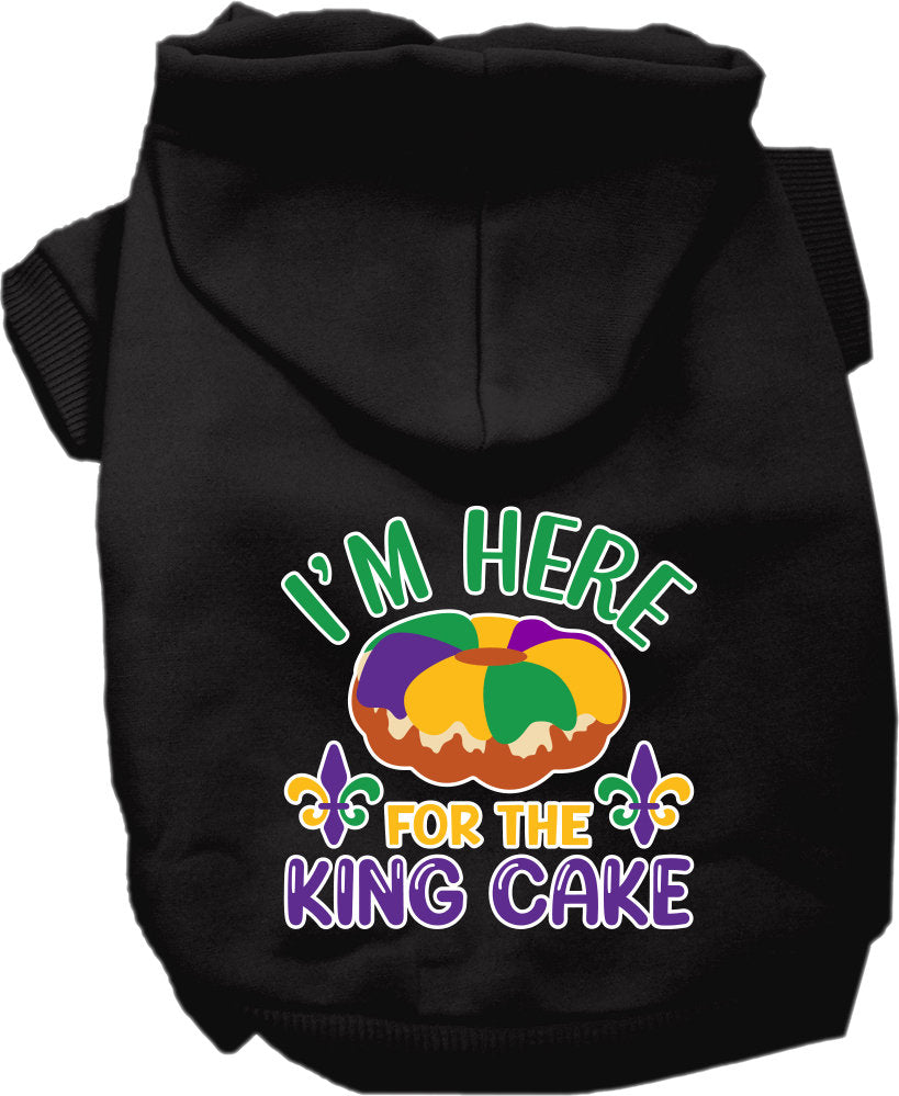 A cozy screen printed hoodie for medium to large pets featuring the phrase 'I'm Here For The King Cake', designed for comfort and durability.