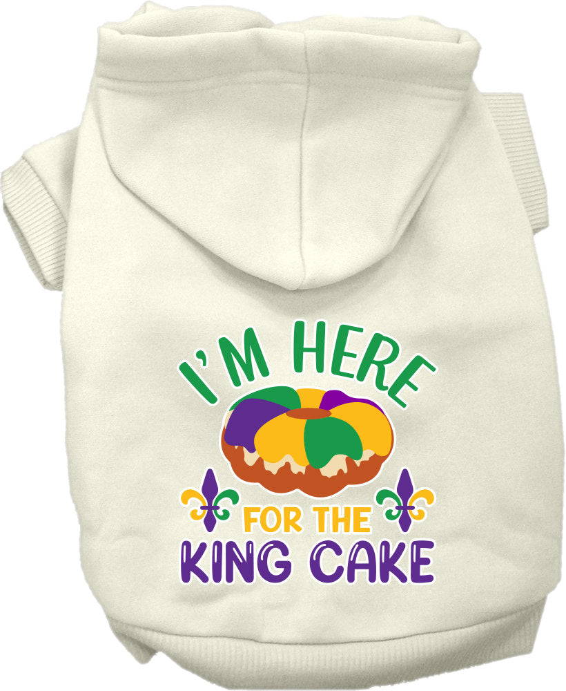 A cozy screen printed hoodie for medium to large pets featuring the phrase 'I'm Here For The King Cake', designed for comfort and durability.