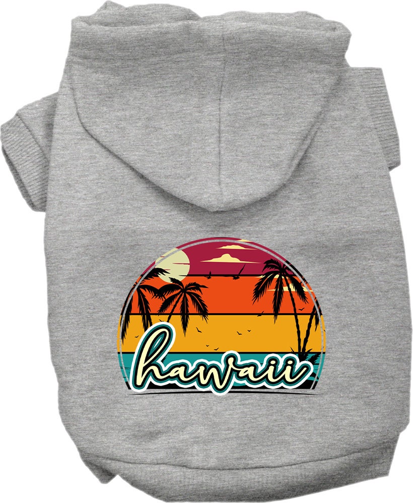 A medium to large pet wearing a stylish screen printed hoodie featuring a Hawaii Retro Beach Sunset design, showcasing its soft fabric and convenient leash access.