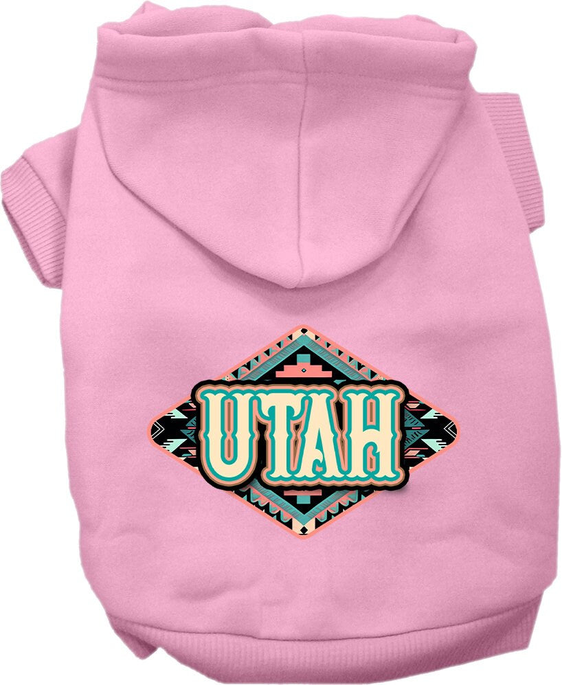 A medium to large pet wearing a soft, warm hoodie with a Utah Peach Aztec print, showcasing its stylish design and convenient leash access.