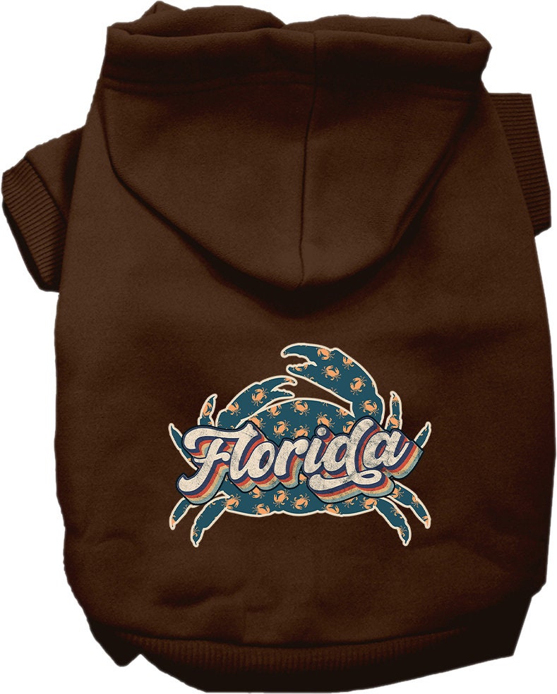 A medium to large pet wearing a soft, stylish hoodie featuring a Florida Retro Crabs design, showcasing comfort and durability.