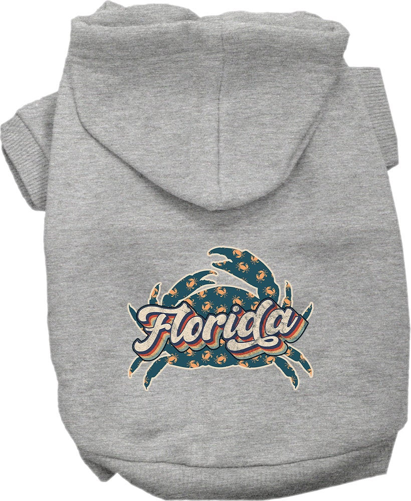 A medium to large pet wearing a soft, stylish hoodie featuring a Florida Retro Crabs design, showcasing comfort and durability.