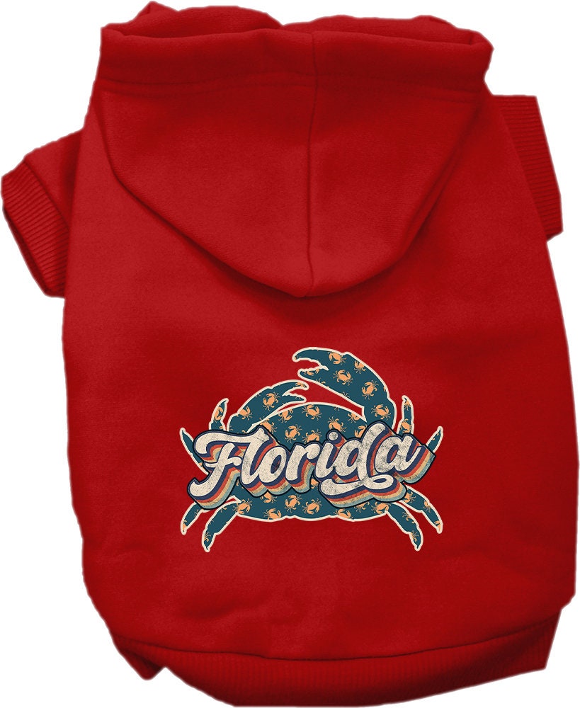 A medium to large pet wearing a soft, stylish hoodie featuring a Florida Retro Crabs design, showcasing comfort and durability.