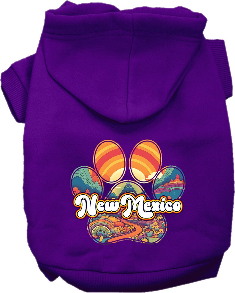 A medium to large pet wearing a soft, warm screen printed hoodie featuring the 'New Mexico Groovy Summit' design, showcasing comfort and style.