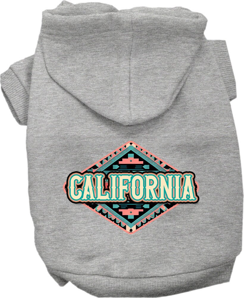 A medium to large pet wearing a soft, warm hoodie with a California Peach Aztec print, showcasing its stylish design and convenient leash access.