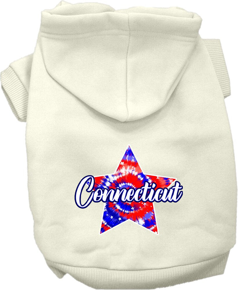 A medium to large pet wearing a Connecticut Patriotic Tie Dye hoodie, showcasing its vibrant colors and comfortable fit.