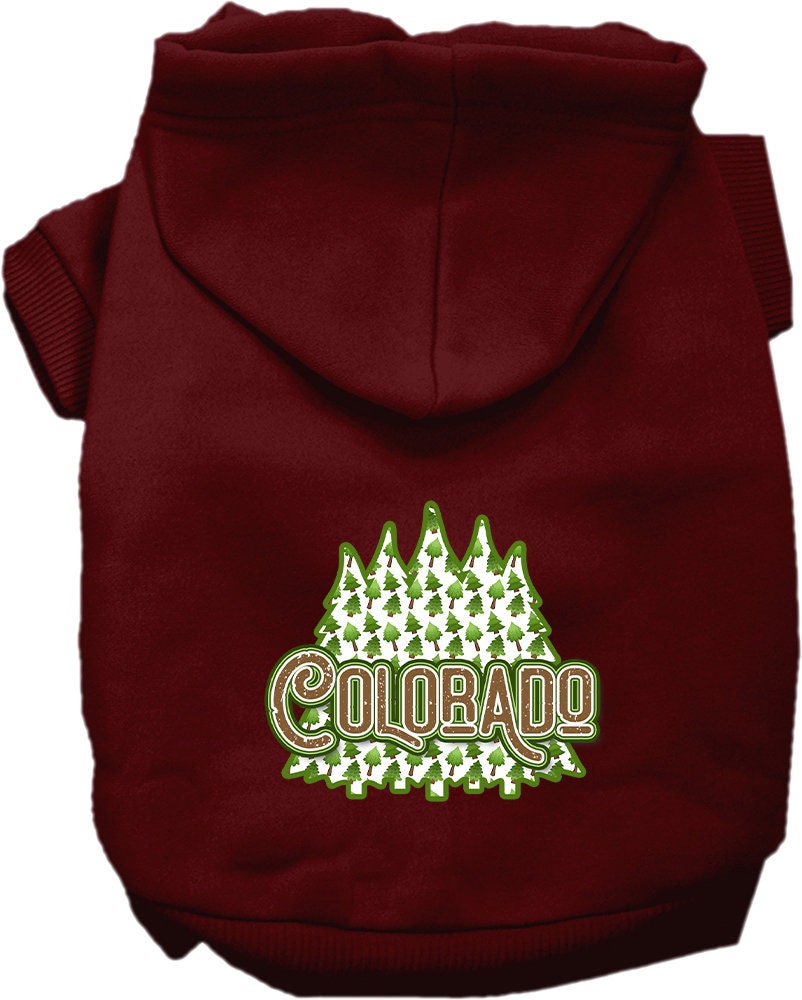 A cozy screen printed hoodie for medium to large pets featuring a Colorado Woodland Trees design, perfect for chilly weather.