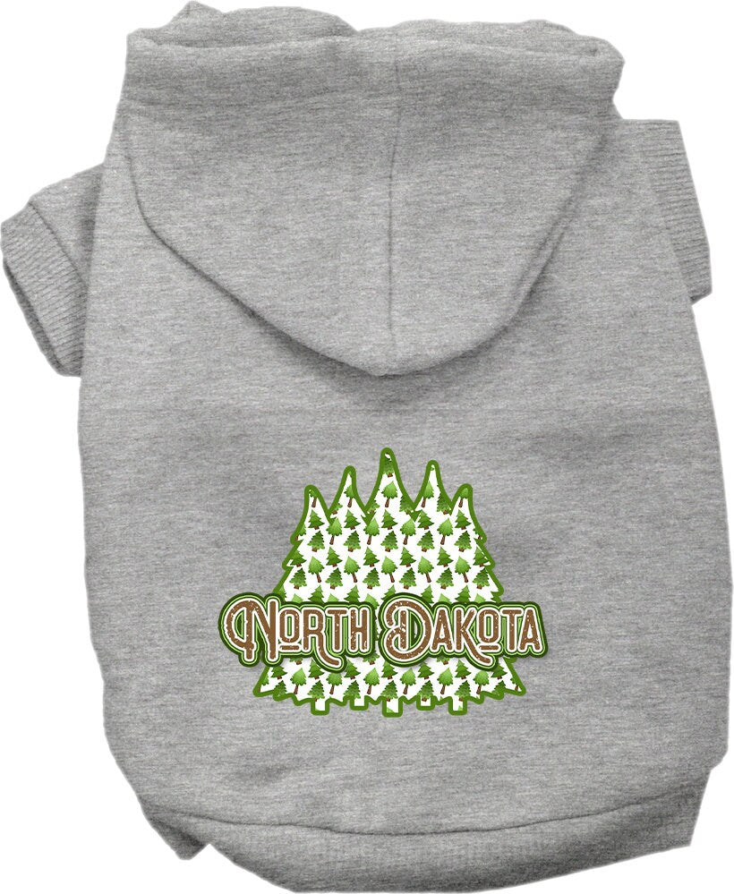 A cozy screen printed hoodie for medium to large pets featuring a North Dakota woodland trees design, perfect for stylish warmth.