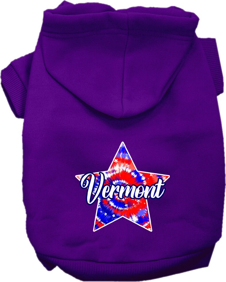 A medium to large pet wearing a Vermont Patriotic Tie Dye hoodie, showcasing its vibrant colors and comfortable fit.