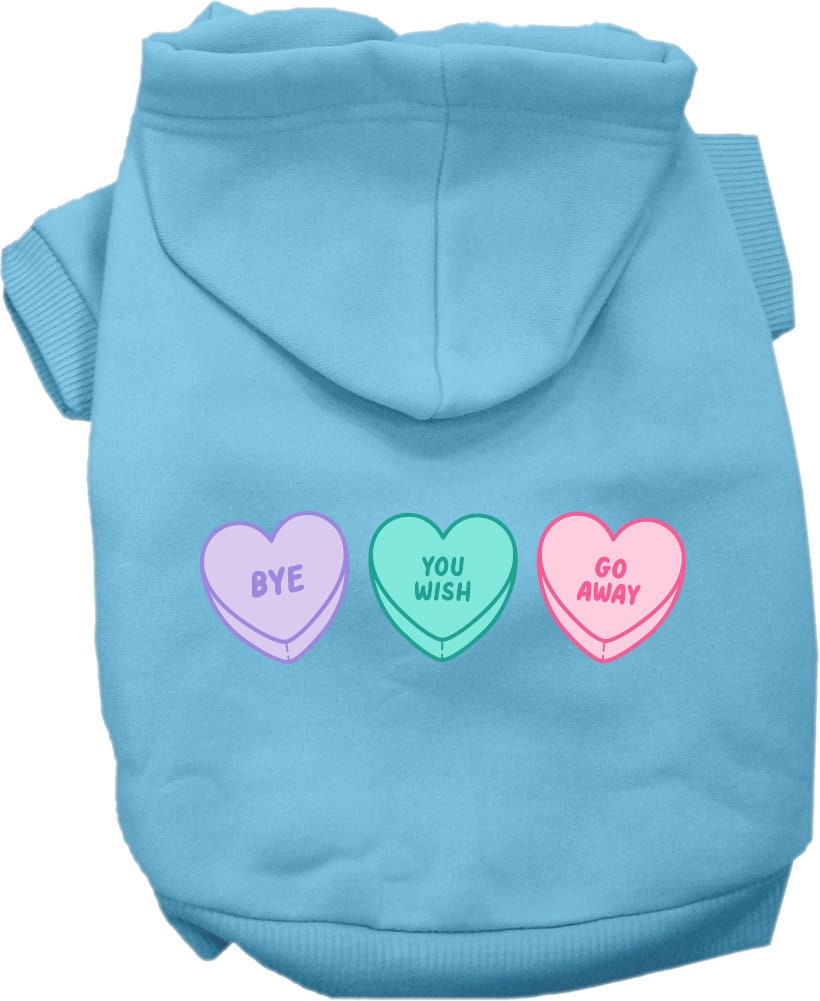 A medium to large pet wearing a soft, warm hoodie with an anti-Valentine's hearts print, showcasing its stylish design and convenient leash access.