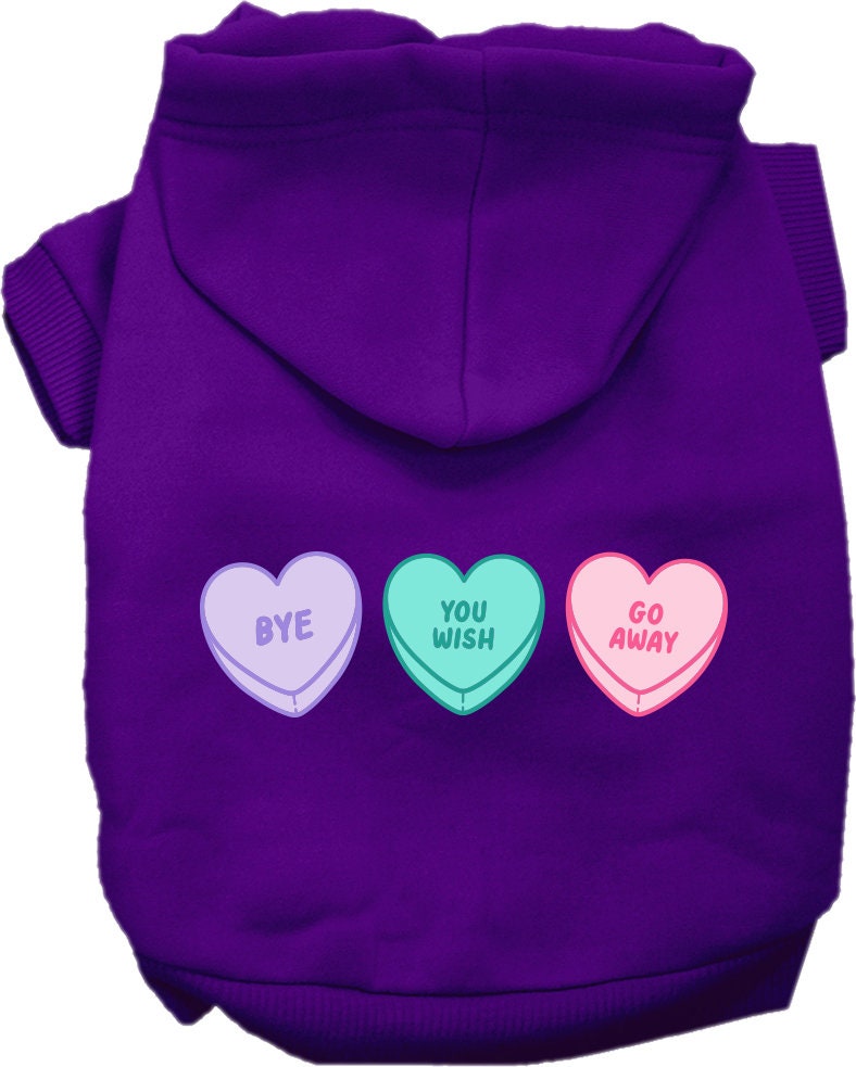 A medium to large pet wearing a soft, warm hoodie with an anti-Valentine's hearts print, showcasing its stylish design and convenient leash access.