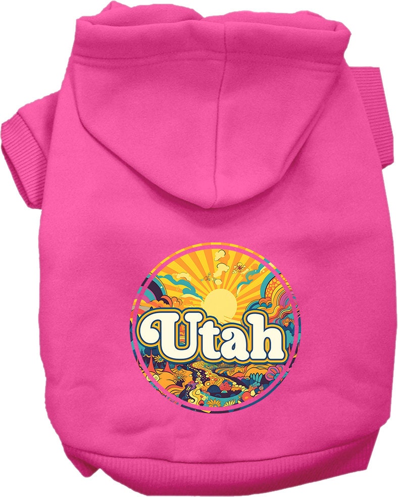 A medium to large pet wearing a soft, warm hoodie with a 'Utah Trippy Peaks' design, showcasing its double-stitched durability and leash access hole.