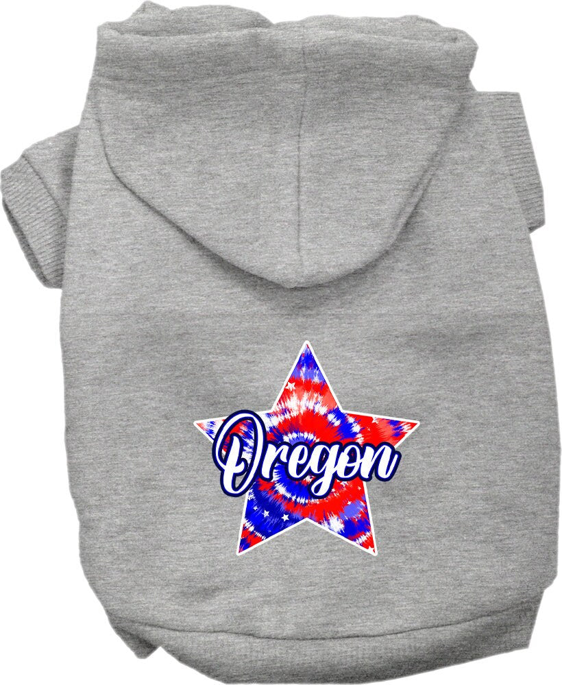 A medium to large pet wearing a vibrant Oregon Patriotic Tie Dye hoodie, showcasing its soft fabric and stylish design.