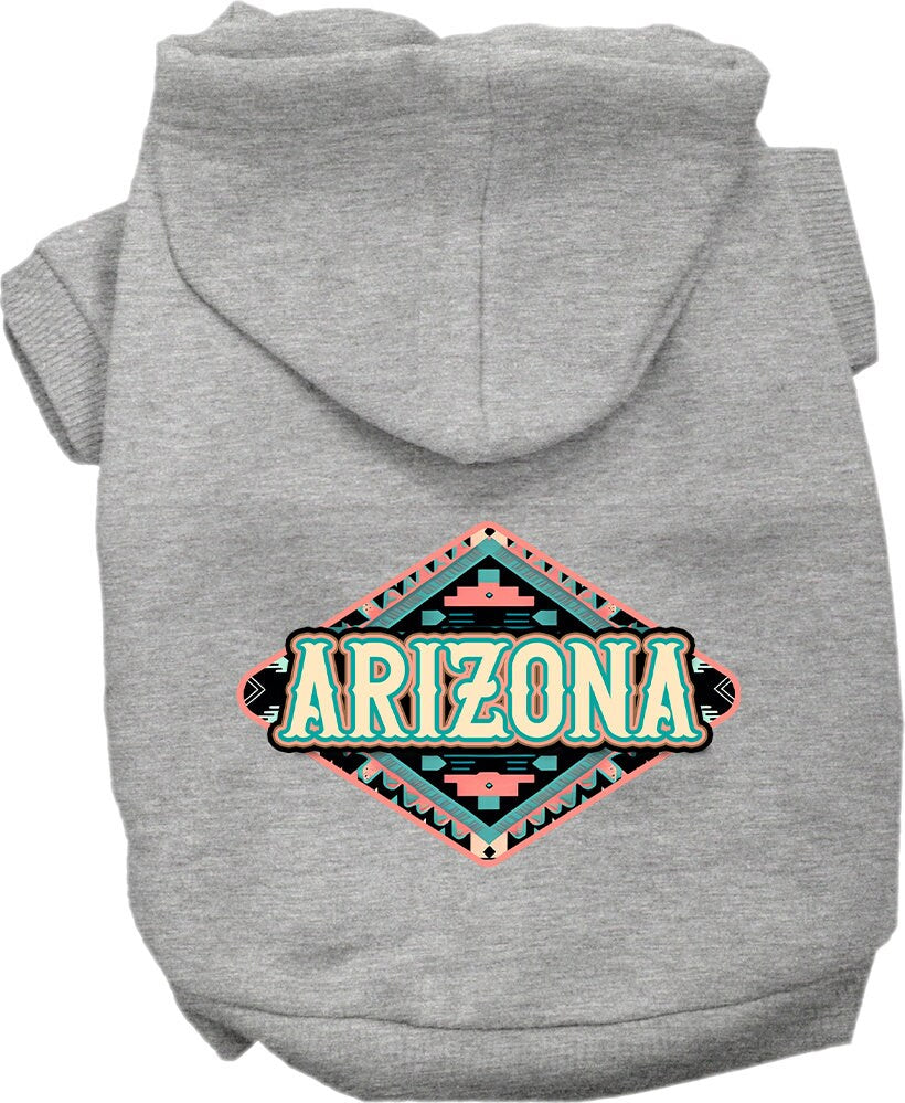 A medium to large pet wearing a soft, warm hoodie with a unique Arizona Peach Aztec print, showcasing its stylish design and convenient leash access.