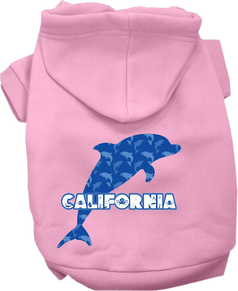 A medium to large pet wearing a California Blue Dolphins screen printed hoodie, showcasing its vibrant design and comfortable fit.