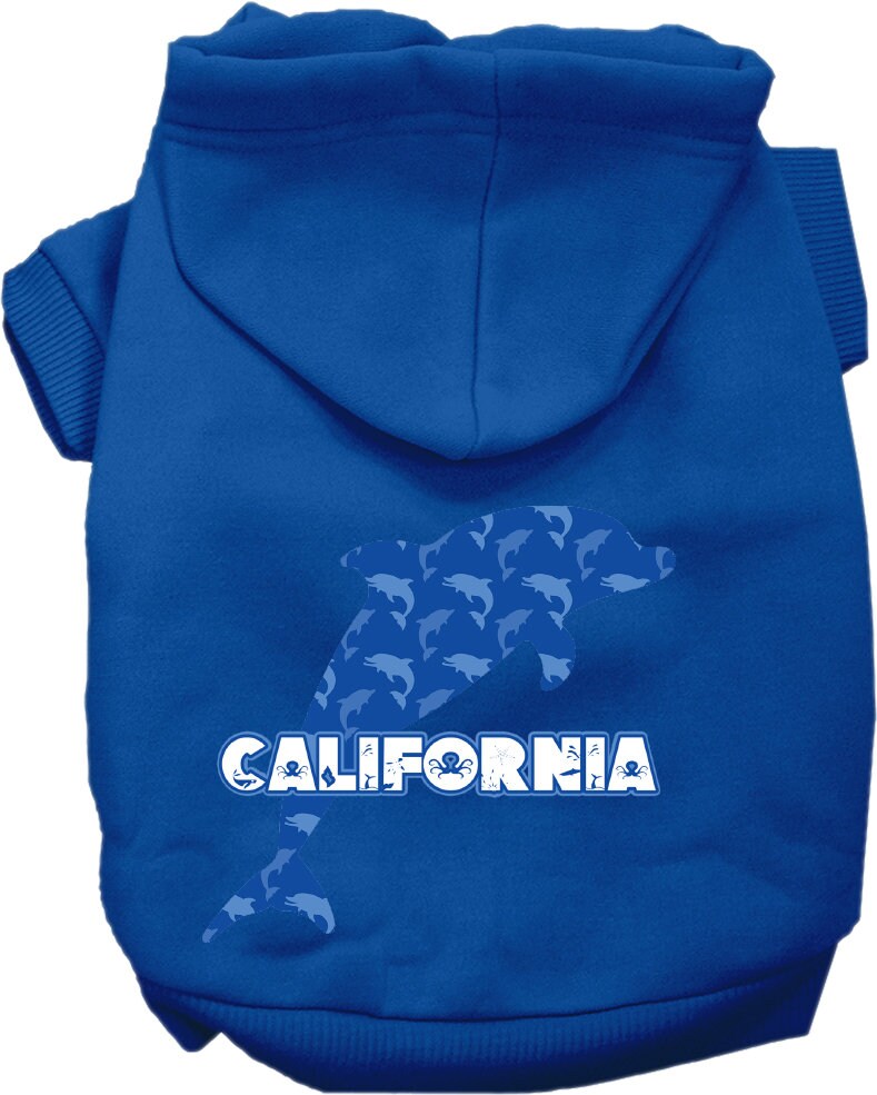 A medium to large pet wearing a California Blue Dolphins screen printed hoodie, showcasing its vibrant design and comfortable fit.
