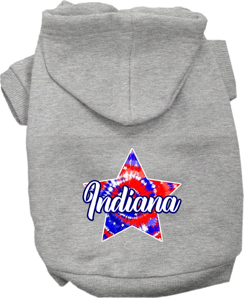 A medium to large pet wearing a stylish Indiana Patriotic Tie Dye hoodie, showcasing its vibrant colors and comfortable fit.