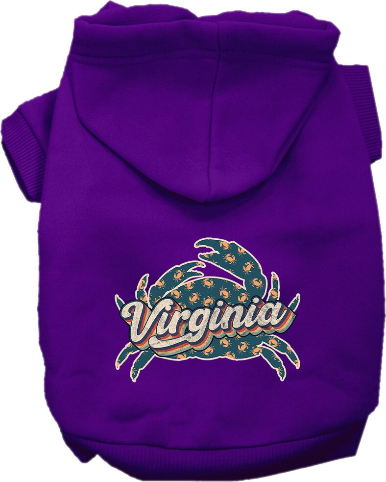 A medium to large pet wearing a soft, warm hoodie with a 'Virginia Retro Crabs' print, showcasing its stylish design and convenient leash access.