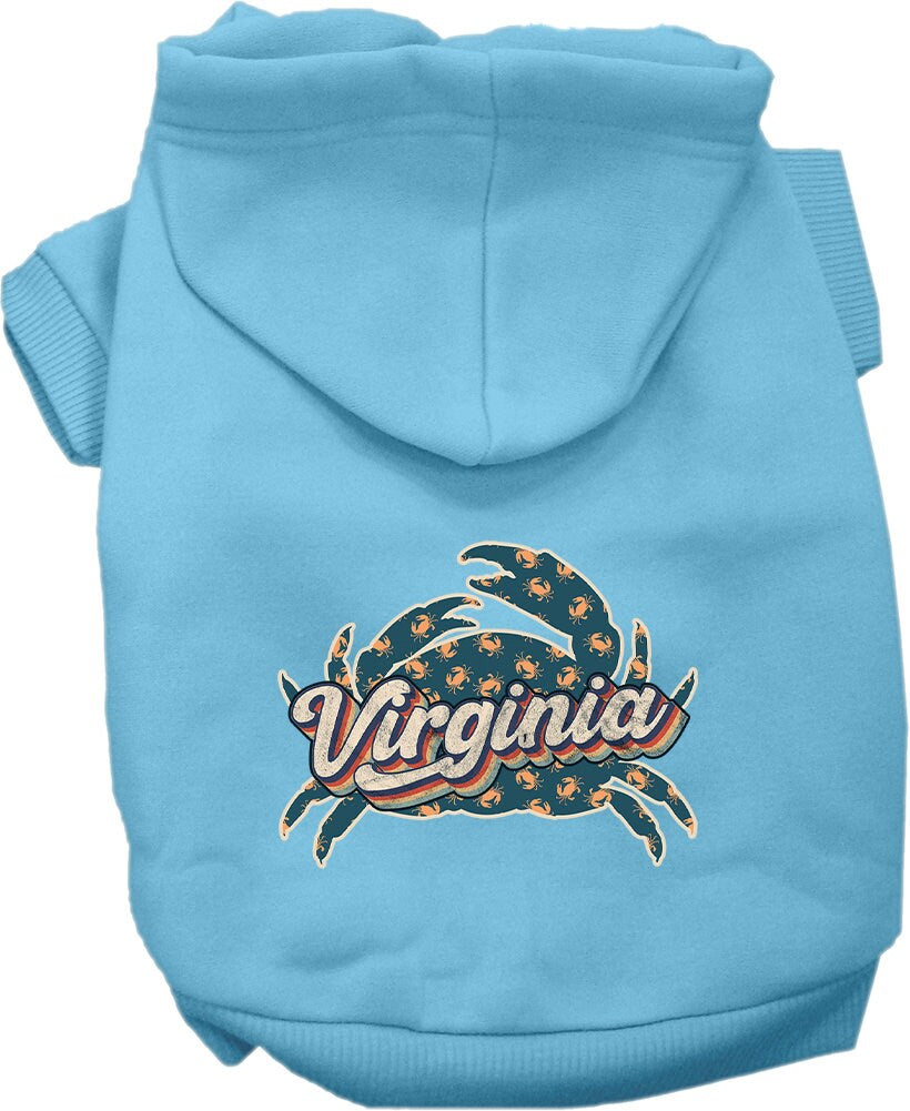 A medium to large pet wearing a soft, warm hoodie with a 'Virginia Retro Crabs' print, showcasing its stylish design and convenient leash access.