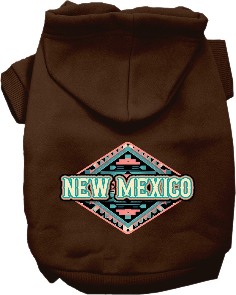 A medium to large pet wearing a soft, warm hoodie with a New Mexico Peach Aztec print, showcasing its stylish design and convenient leash access.