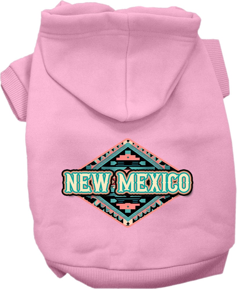 A medium to large pet wearing a soft, warm hoodie with a New Mexico Peach Aztec print, showcasing its stylish design and convenient leash access.
