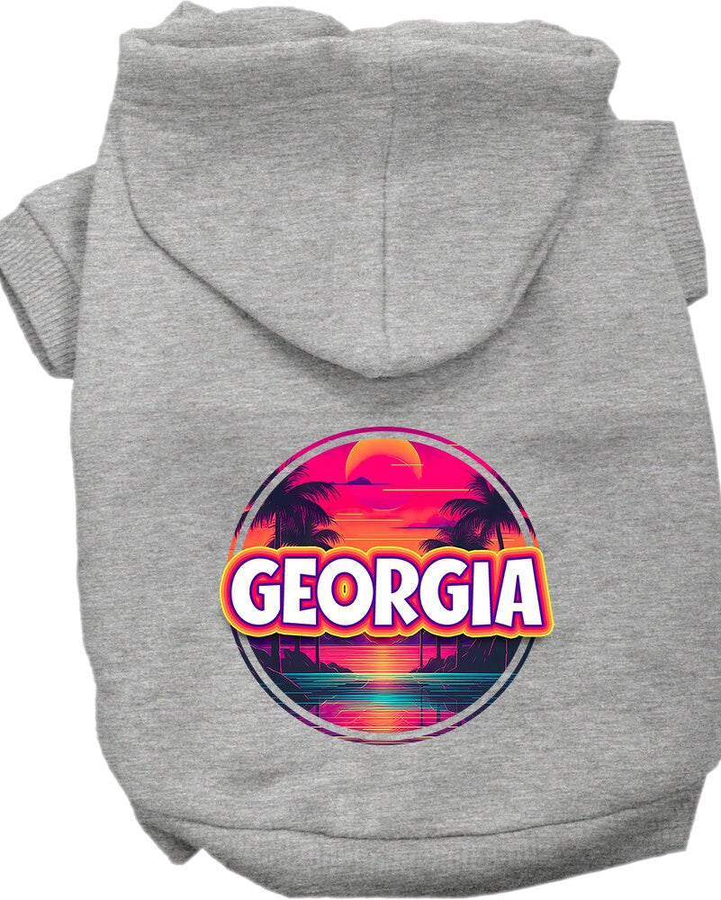 A medium to large pet wearing a vibrant Georgia Neon Beach Sunset hoodie, showcasing its soft fabric and convenient leash access hole.