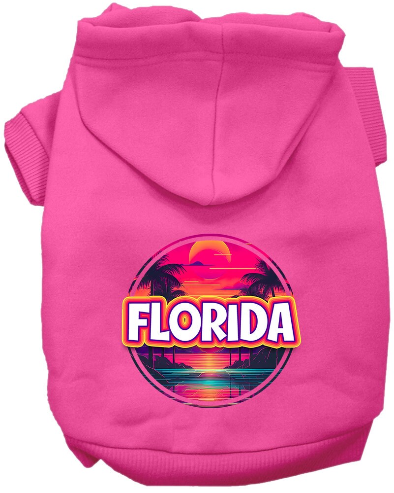 A medium to large pet wearing a soft, stylish hoodie with a vibrant Florida Neon Beach Sunset print, showcasing comfort and durability.