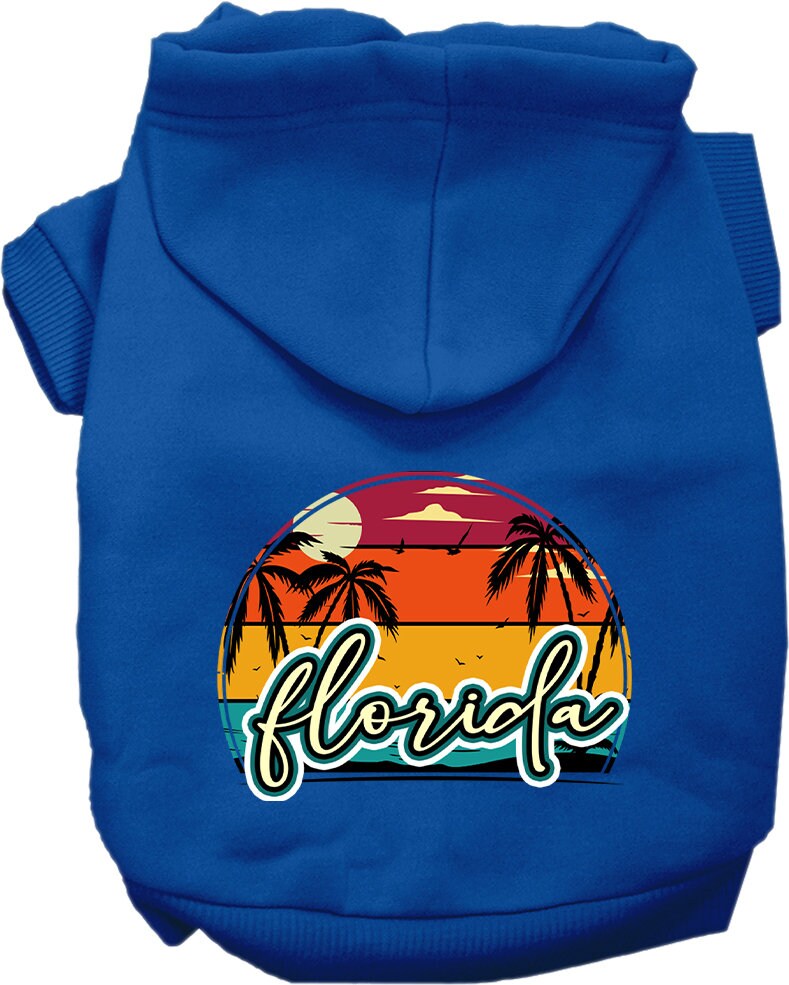 A medium to large pet wearing a soft, stylish hoodie featuring a Florida Retro Beach Sunset design, perfect for walks and lounging.