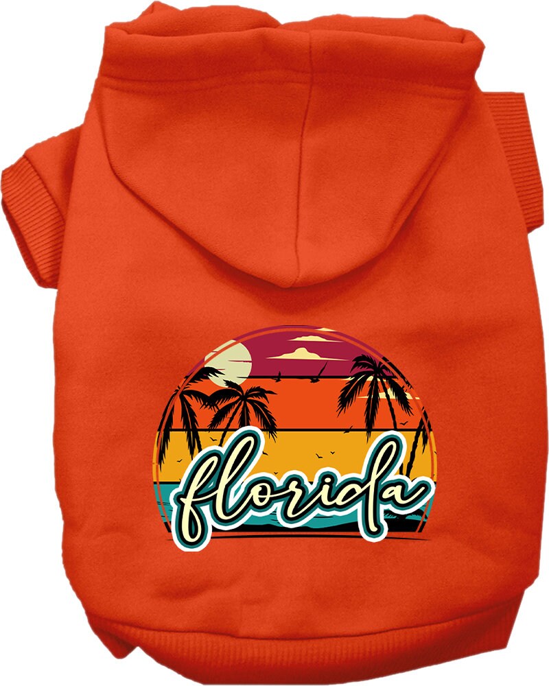 A medium to large pet wearing a soft, stylish hoodie featuring a Florida Retro Beach Sunset design, perfect for walks and lounging.