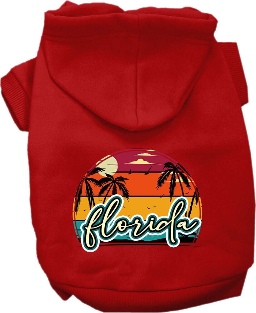 A medium to large pet wearing a soft, stylish hoodie featuring a Florida Retro Beach Sunset design, perfect for walks and lounging.
