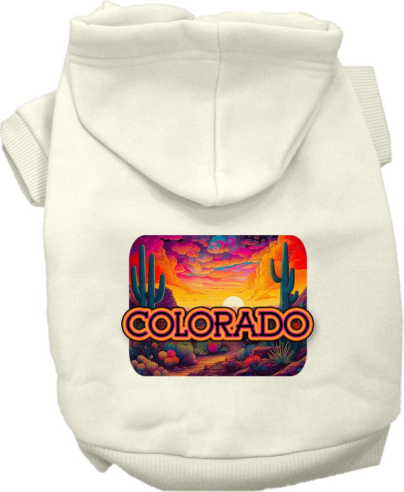 A small to medium pet wearing a colorful 'Colorado Neon Desert' hoodie, showcasing its soft fabric and stylish design.