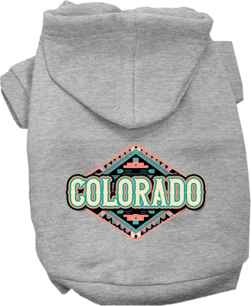 A cozy screen printed hoodie for small to medium pets, featuring a Colorado Peach Aztec design, perfect for dogs and cats.