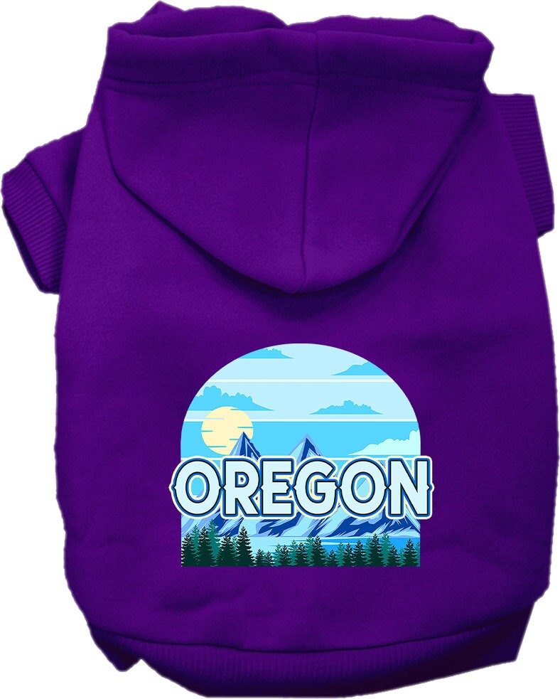A small to medium pet wearing a cozy Oregon Trailblazer hoodie, showcasing its soft fabric and stylish design.