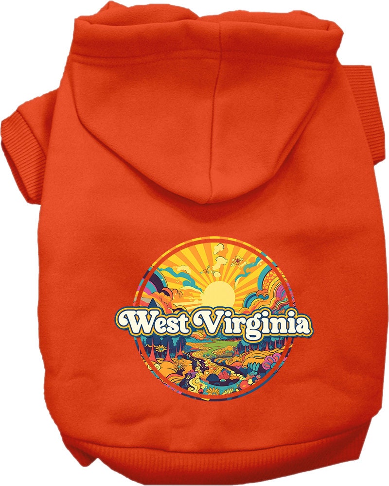 A small to medium pet wearing a cozy 'West Virginia Trippy Peaks' hoodie, showcasing its vibrant design and convenient leash access hole.